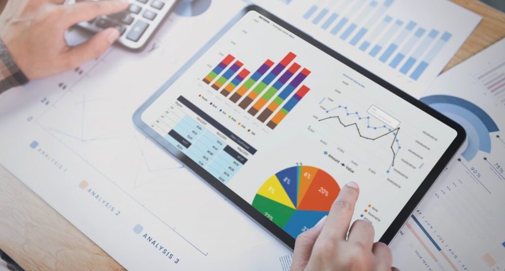 businesswoman-using-tablet-analysis-graph-company-finance-strategy-statistics-success-concept-planning-future-office-room-1024x633-1 (1)